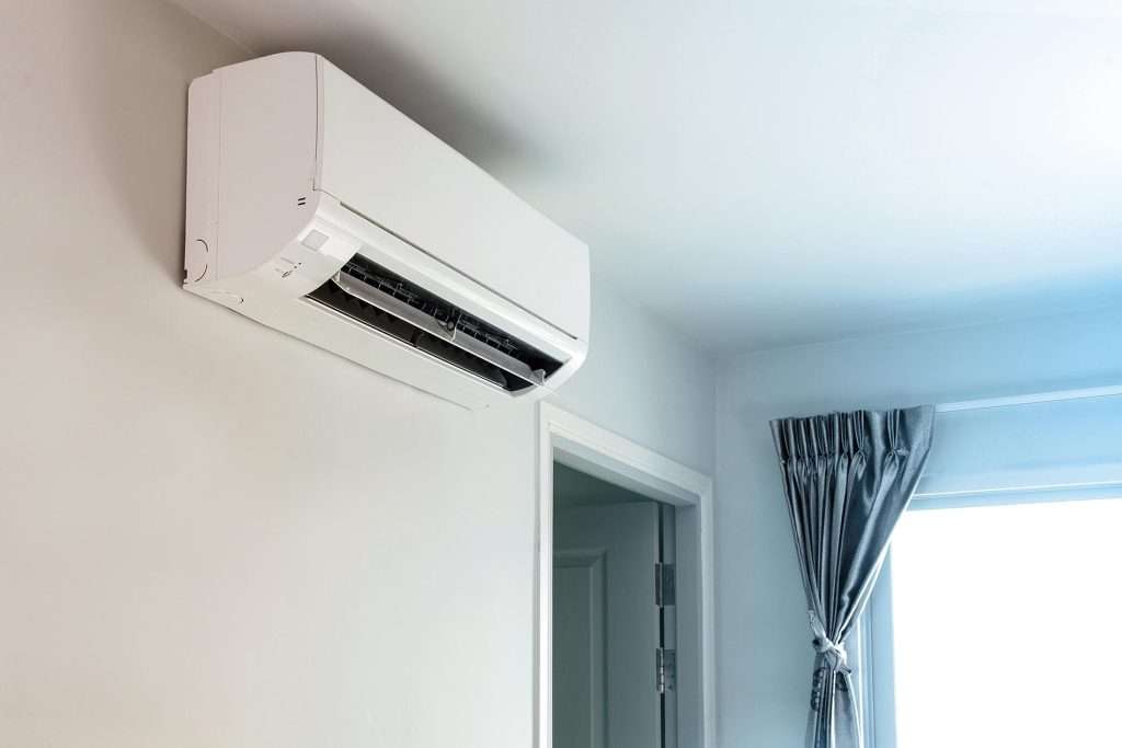 Air conditioner on wall background